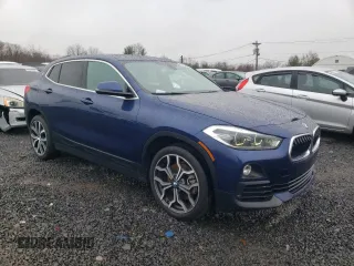 2018 BMW X2 xDrive28i with VIN WBXYJ5C31JEF72966, listed as a Copart auction lot 50184495 with 83,557 mi miles and Salvage Title. Bid and sale history available at carsss.com. Image 4.