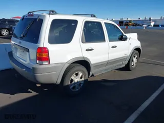 2001 Ford Escape XLT with VIN 1FMYU04181KD97470, listed as a IAAI auction lot 41896246 with 123,880 mi miles. Bid and sale history available at carsss.com. Image 4.