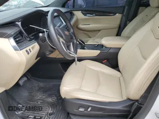 2017 Cadillac XT5 FWD with VIN 1GYKNARS0HZ314818, listed as a Copart auction lot 51158785 with 87,091 mi miles and Clean title. Bid and sale history available at DreamBid. Image 7.