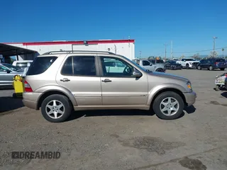 2002 Mercedes-Benz M 320/430/500 with VIN 4JGAB75E42A322824, listed as a IAAI auction lot 41871249 with 203,845 mi miles and . Bid and sale history available at carsss.com. Image 13.