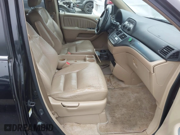 2006 Honda Odyssey EX-L z VIN 5FNRL38746B083881, wystawiony jako IAAI lot #42363976 z przebiegiem 252 746 mil mil oraz . Historia ofert i sprzedaży dostępna na DreamBid. Obrazek 5.