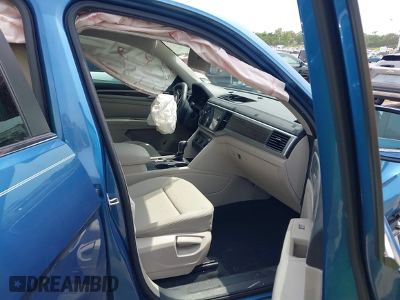 2019 Volkswagen Atlas SE z VIN 1V2WR2CA5KC524650, wystawiony jako IAAI lot #42217791 z przebiegiem 92 571 mil mil oraz . Historia ofert i sprzedaży dostępna na DreamBid. Obrazek 5.