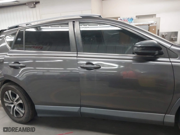 2017 Toyota RAV4 LE with VIN JTMBFREV9HJ132888, listed as a IAAI auction lot 41946329 with 100,982 mi miles. Bid and sale history available at carsss.com. Image 13.