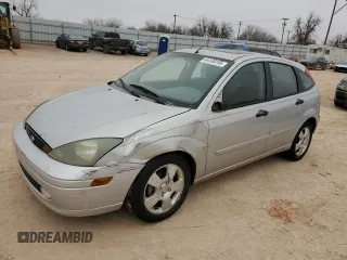 2004 Ford Focus with VIN 3FAFP37Z14R102723, listed as a Copart auction lot 44138195 with 220,354 mi miles and Salvage title. Bid and sale history available at DreamBid. Image 1.