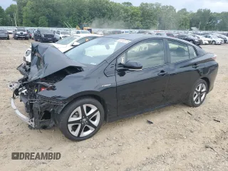 2017 Toyota Prius Two z VIN JTDKARFU7H3031681, wystawiony jako Copart lot #55140775 z przebiegiem 74 591 mil mil oraz Szkoda całkowita • Salvage title. Historia ofert i sprzedaży dostępna na DreamBid. Obrazek 1.