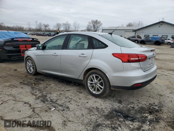2015 Ford Focus SE with VIN 1FADP3F29FL370335, listed as a Copart auction lot 51010975 with 215,026 mi miles and Clean Title. Bid and sale history available at DreamBid. Image 2.