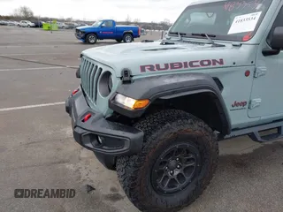 2023 Jeep Wrangler Rubicon with VIN 1C4JJXFG7PW654564, listed as a IAAI auction lot 41833534 with 22,277 mi miles and . Bid and sale history available at DreamBid. Image 18.