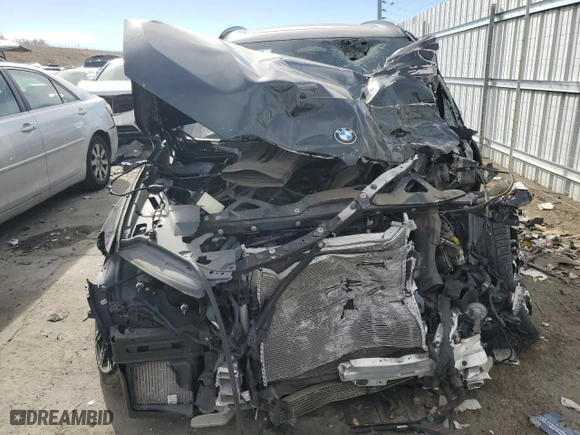 2021 BMW X5 M with VIN 5YMJU0C0XM9H13455, listed as a Copart auction lot 43664295 with NaN miles and Salvage Title. Bid and sale history available at carsss.com. Image 5.