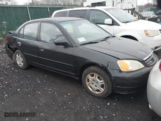 2001 Honda Civic LX with VIN 2HGES16511H554283, listed as a IAAI auction lot 41820187 with 999,999 mi miles. Bid and sale history available at carsss.com. Image 1.