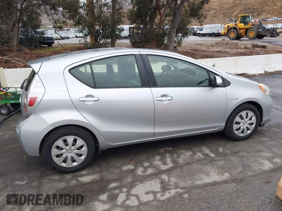 2014 Toyota Prius One with VIN JTDKDTB33E1067408, listed as a IAAI auction lot 41573895 with 245,383 mi miles and . Bid and sale history available at DreamBid. Image 13.
