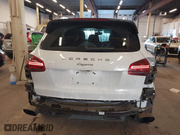 2016 Porsche Cayenne with VIN WP1AA2A26GLA10357, listed as a IAAI auction lot 41370956 with 96,026 mi miles. Bid and sale history available at carsss.com. Image 17.