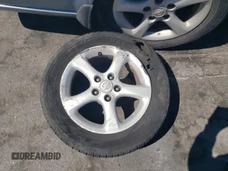 2000 Nissan Maxima GXE z VIN JN1CA31D9YT543874, wystawiony jako Copart lot #69275784 z przebiegiem 214 833 mil mil oraz Szkoda całkowita • Salvage title. Historia ofert i sprzedaży dostępna na DreamBid. Obrazek 12.