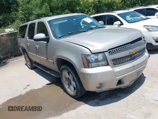 2007 Chevrolet Suburban LT z VIN 1GNFK16327J350303, wystawiony jako IAAI lot #42413524 z przebiegiem 215 353 mil mil oraz . Historia ofert i sprzedaży dostępna na DreamBid. Obrazek 1.