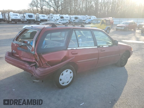 1996 Ford Escort z VIN 1FASP15J7TW112703, wystawiony jako Copart lot #84905564 z przebiegiem 119 575 mil mil oraz Szkoda całkowita • Salvage title. Historia ofert i sprzedaży dostępna na DreamBid. Obrazek 3.