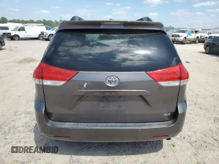 2012 Toyota Sienna XLE AAS with VIN 5TDYK3DCXCS199580, listed as a Copart auction lot 52455405 with 113,259 mi miles and Salvage Title. Bid and sale history available at DreamBid. Image 6.