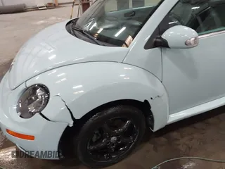 2006 Volkswagen Beetle z VIN 3VWRF31Y26M310844, wystawiony jako IAAI lot #42192356 z przebiegiem 120 740 mil mil oraz . Historia ofert i sprzedaży dostępna na DreamBid. Obrazek 6.