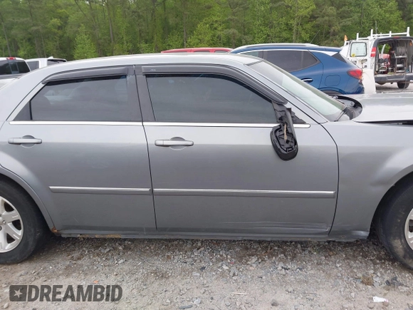 2006 Chrysler 300 Touring with VIN 2C3KA53G56H224403, listed as a IAAI auction lot 42042832 with 137,764 mi miles and . Bid and sale history available at DreamBid. Image 14.