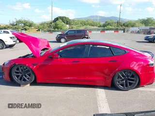 2022 Tesla Model S Plaid with VIN 5YJSA1E61NF460253, listed as a IAAI auction lot 40328727 with Not provided miles and . Bid and sale history available at DreamBid. Image 15.