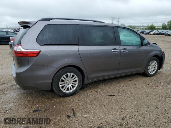 2015 Toyota Sienna XLE with VIN 5TDYK3DC0FS686792, listed as a Copart auction lot 57472045 with 222,663 mi miles and Salvage title. Bid and sale history available at DreamBid. Image 3.