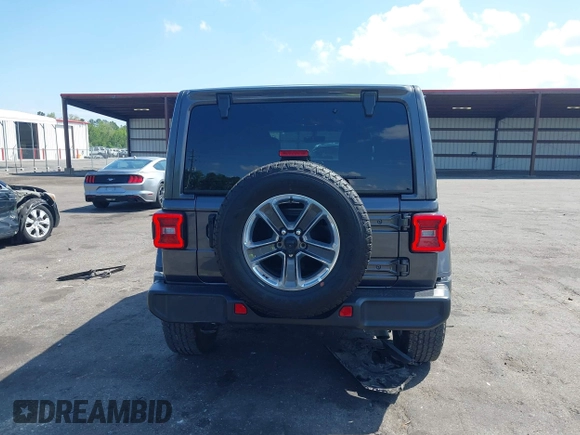 2022 Jeep Wrangler Unlimited Sahara with VIN 1C4HJXEN2NW194502, listed as a IAAI auction lot 42002455 with 34,861 mi miles and . Bid and sale history available at DreamBid. Image 16.