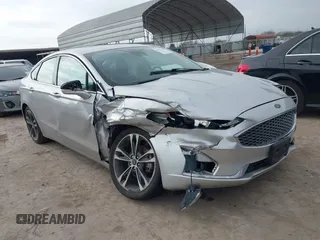 2019 Ford Fusion Titanium with VIN 3FA6P0D9XKR206465, listed as a IAAI auction lot 41577306 with 70,668 mi miles. Bid and sale history available at carsss.com. Image 1.