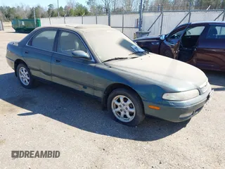 1996 Mazda 626 with VIN 1YVGE22D3T5512235, listed as a IAAI auction lot 41807320 with 85,772 mi miles and . Bid and sale history available at DreamBid. Image 1.
