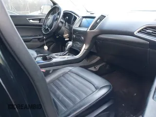 2016 Ford Edge SEL with VIN 2FMPK3J98GBB99956, listed as a IAAI auction lot 41627788 with 69,048 mi miles. Bid and sale history available at carsss.com. Image 5.