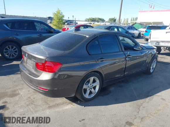 2014 BMW 3 Series 328d xDrive with VIN WBA3D5C58EKX97290, listed as a IAAI auction lot 40453599 with Not Provided miles. Bid and sale history available at carsss.com. Image 4.