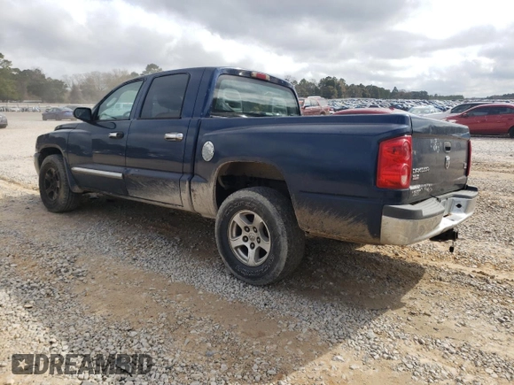2005 Dodge Dakota SLT with VIN 1D7HE48N15S223063, listed as a Copart auction lot 43223535 with 167,501 mi miles and Salvage Title. Bid and sale history available at DreamBid. Image 2.