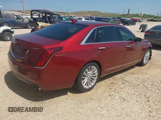 2017 Cadillac CT6 Luxury RWD z VIN 1G6KC5RX6HU184266, wystawiony jako IAAI lot #42081396 z przebiegiem 62 398 mil mil oraz . Historia ofert i sprzedaży dostępna na DreamBid. Obrazek 4.