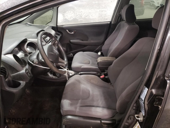 2009 Honda Fit with VIN JHMGE88259S053426, listed as a Copart auction lot 87894815 with 143,665 mi miles and Salvage Title. Bid and sale history available at carsss.com. Image 7.