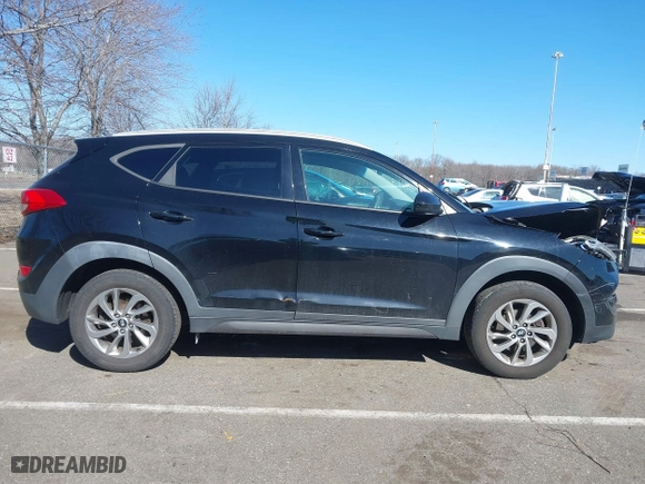 2016 Hyundai Tucson SE with VIN KM8J3CA41GU133962, listed as a IAAI auction lot 41634282 with 101,705 mi miles. Bid and sale history available at carsss.com. Image 13.