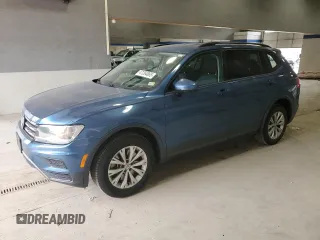 2018 Volkswagen Tiguan S with VIN 3VV0B7AXXJM096542, listed as a Copart auction lot 47264865 with 98,692 mi miles and Salvage Title. Bid and sale history available at DreamBid. Image 1.