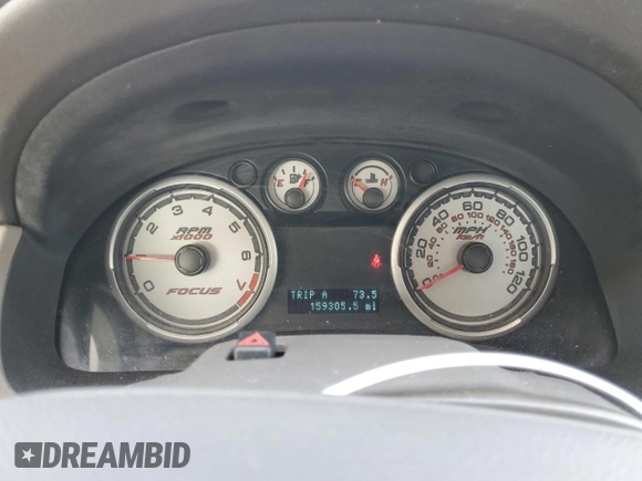 2009 Ford Focus SE z VIN 1FAHP35N69W183425, wystawiony jako Copart lot #54560985 z przebiegiem 159 305 mil mil oraz Szkoda całkowita • Salvage title. Historia ofert i sprzedaży dostępna na DreamBid. Obrazek 9.