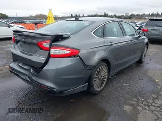 2014 Ford Fusion Titanium with VIN 3FA6P0K9XER271369, listed as a IAAI auction lot 41622854 with 187,471 mi miles. Bid and sale history available at carsss.com. Image 4.