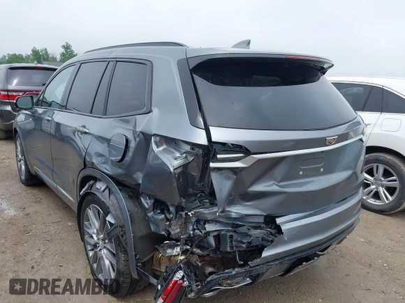 2021 Cadillac XT6 Sport with VIN 1GYKPGRS6MZ128112, listed as a IAAI auction lot 42415342 with 57,680 mi miles and . Bid and sale history available at DreamBid. Image 3.