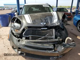 2012 MINI Countryman S z VIN WMWZC5C52CWL55608, wystawiony jako Copart lot #56424275 z przebiegiem 126 669 mil mil oraz Szkoda całkowita • Salvage title. Historia ofert i sprzedaży dostępna na DreamBid. Obrazek 5.