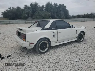 1989 Toyota MR2 z VIN JT2AW15C9K0154276, wystawiony jako Copart lot #78778464 z przebiegiem 234 520 mil mil oraz Szkody całkowita. Historia ofert i sprzedaży dostępna na DreamBid. Obrazek 3.