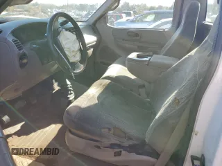 2000 Ford F-150 XL with VIN 1FTRF18W0YNB59622, listed as a Copart auction lot 50178485 with 264,057 mi miles and Salvage title. Bid and sale history available at DreamBid. Image 7.