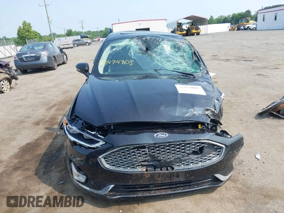2019 Ford Fusion Titanium with VIN 3FA6P0D92KR247270, listed as a IAAI auction lot 42474803 with Not provided miles and . Bid and sale history available at DreamBid. Image 11.