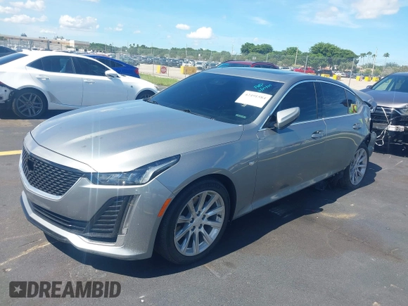 2023 Cadillac CT5 Luxury z VIN 1G6DW5RK3P0106764, wystawiony jako IAAI lot #42491584 z przebiegiem 32 223 mil mil oraz . Historia ofert i sprzedaży dostępna na DreamBid. Obrazek 2.