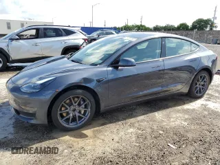 2022 Tesla Model 3 Long Range z VIN 5YJ3E1EB1NF287758, wystawiony jako Copart lot #60955925 z przebiegiem 153 861 mil mil oraz Czysty tytuł • Clean title. Historia ofert i sprzedaży dostępna na DreamBid. Obrazek 1.