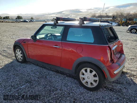 2004 MINI Hardtop with VIN WMWRC33434TC53820, listed as a Copart auction lot 85389994 with 164,452 mi miles and Salvage Title. Bid and sale history available at DreamBid. Image 2.