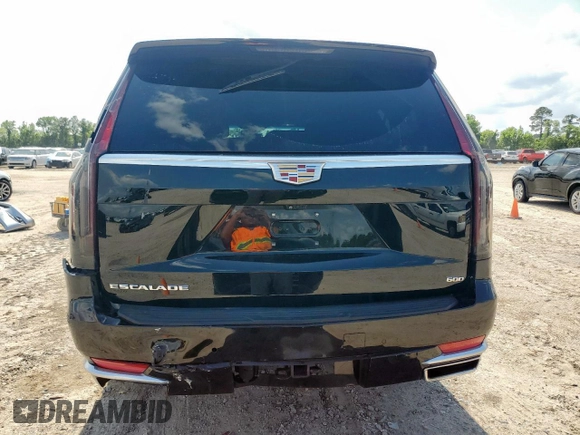 2023 Cadillac Escalade z VIN 1GYS3KKL9PR262067, wystawiony jako Copart lot #59101095 z przebiegiem 43 884 mil mil oraz Szkody całkowita. Historia ofert i sprzedaży dostępna na DreamBid. Obrazek 6.