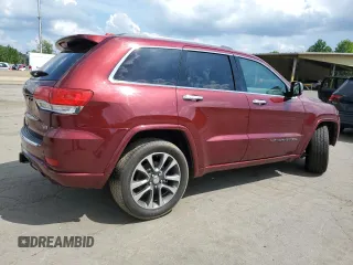 2017 Jeep Grand Cherokee Overland with VIN 1C4RJFCG5HC874130, listed as a Copart auction lot 65324695 with 101,588 mi miles and Salvage title. Bid and sale history available at DreamBid. Image 3.