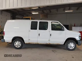 2012 Ford Econoline Cargo Commercial with VIN 1FTNE1EW1CDA97975, listed as a IAAI auction lot 41552574 with 54,665 mi miles and . Bid and sale history available at DreamBid. Image 13.