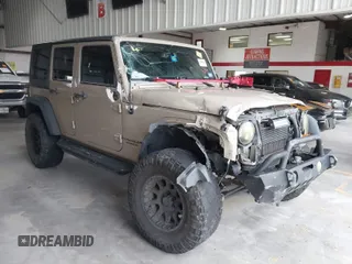 2017 Jeep Wrangler Unlimited Sport with VIN 1C4BJWDG0HL568744, listed as a IAAI auction lot 41592030 with 103,057 mi miles. Bid and sale history available at carsss.com. Image 1.
