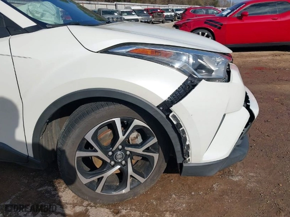 2019 Toyota C-HR XLE with VIN JTNKHMBX2K1041838, listed as a IAAI auction lot 41511513 with 107,145 mi miles. Bid and sale history available at carsss.com. Image 19.