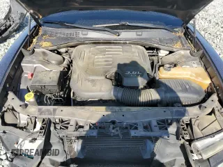 2014 Dodge Charger SXT z VIN 2C3CDXHG1EH315764, wystawiony jako Copart lot #57605135 z przebiegiem 273 912 mil mil oraz Szkoda całkowita • Salvage title. Historia ofert i sprzedaży dostępna na DreamBid. Obrazek 11.