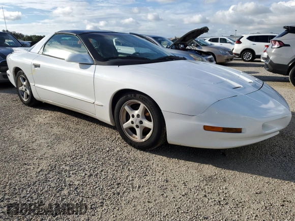 1997 Pontiac Firebird Firebird z VIN 2G2FS22K5V2232134, wystawiony jako Copart lot #74087964 z przebiegiem Nie podano mil oraz Szkoda całkowita • Salvage title. Historia ofert i sprzedaży dostępna na DreamBid. Obrazek 4.